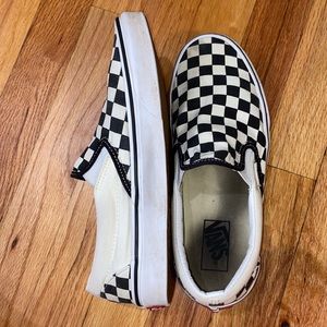 Black and white checkered slip on vans